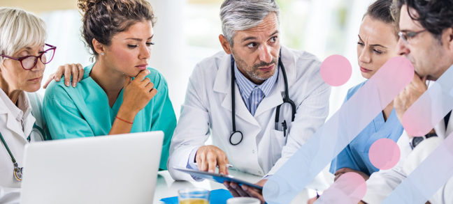 A diverse group of doctors and medical professionals discuss a treatment plan together