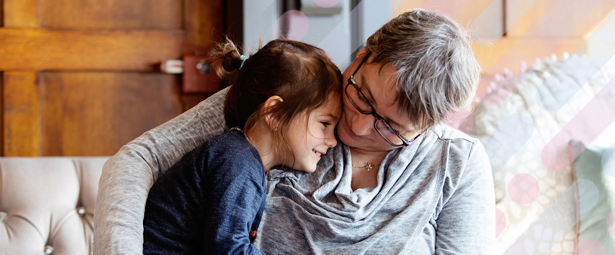 A Resensation patient embraces a child against her chest